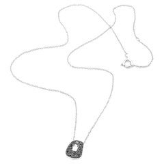 Mattioli Mini Puzzle Pendant in white gold and black diamonds