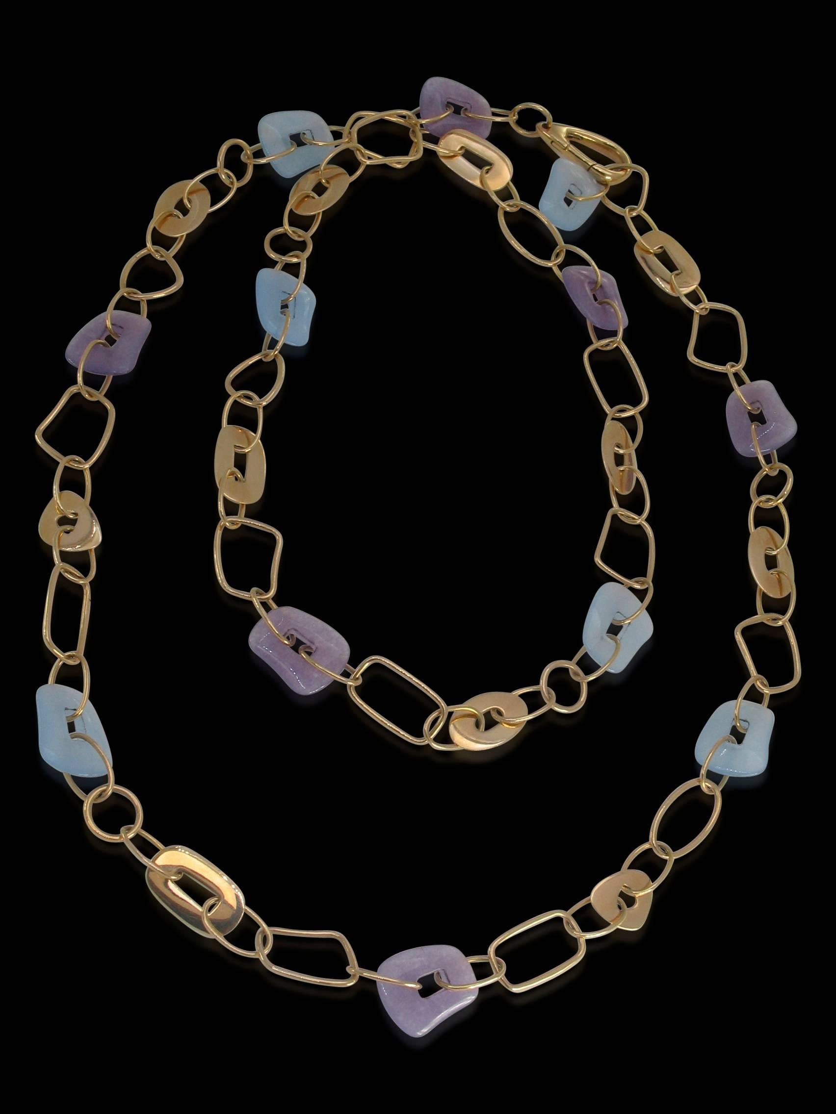From the Puzzle Collection by Mattioli, this necklace blends inspiration both from abstract art and the 70s. Suitable for almost every occasion, this 18K rose gold necklace features blue and lavender jade enhancers and a clasp to wear as a single