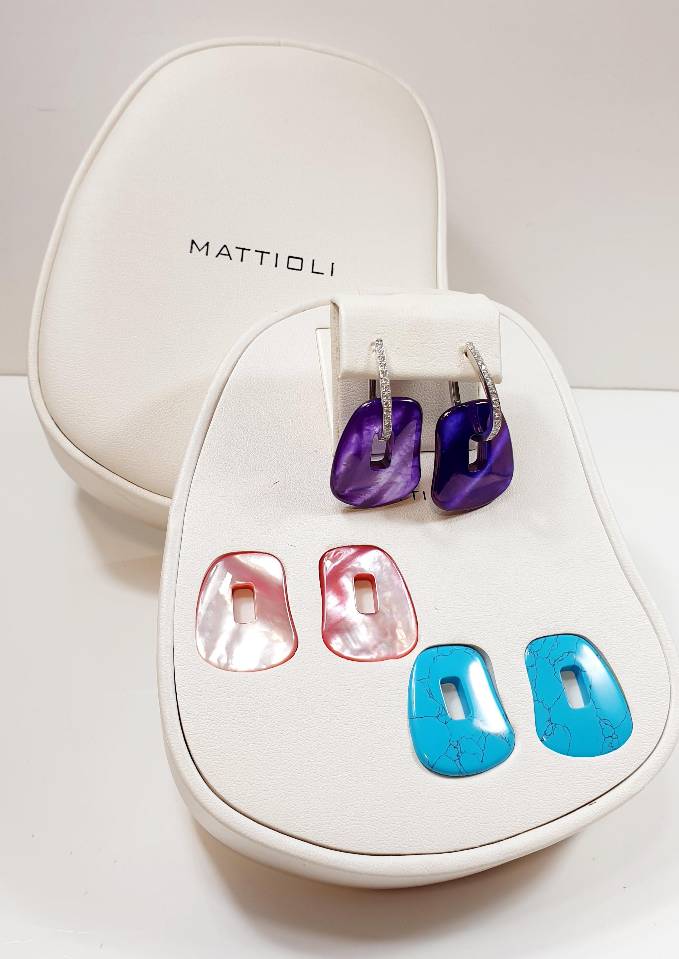 Mattioli Puzzle 18 Karat & White Diamonds Medium Size Earrings
Options in Yellow, Rose and white colour gold 
Puzzle Medium Earrings Box + Three Pairs Of Coloured Puzzles

Gold Weight 3.80gr.
Diamond carats: 0,40 ct
Measure 20x25mm or 0.78x0.98