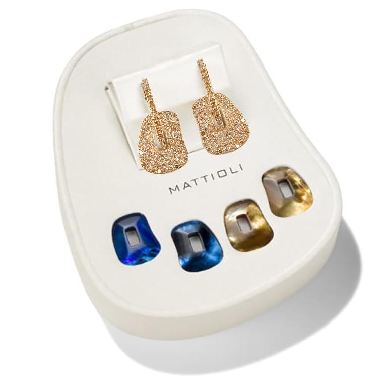 Mattioli Puzzle Collection 18 Karat Rose Gold & Brown Diamonds Pavè Small Size and two coloured pairs of puzzles to your choice.

Measure 15x18 mm / 0,59x0,70 in. 
Gold Weight 8.00 gr. 
Diamonds aprox 1.78 ct.
Puzzle pendants of mother of pearl you