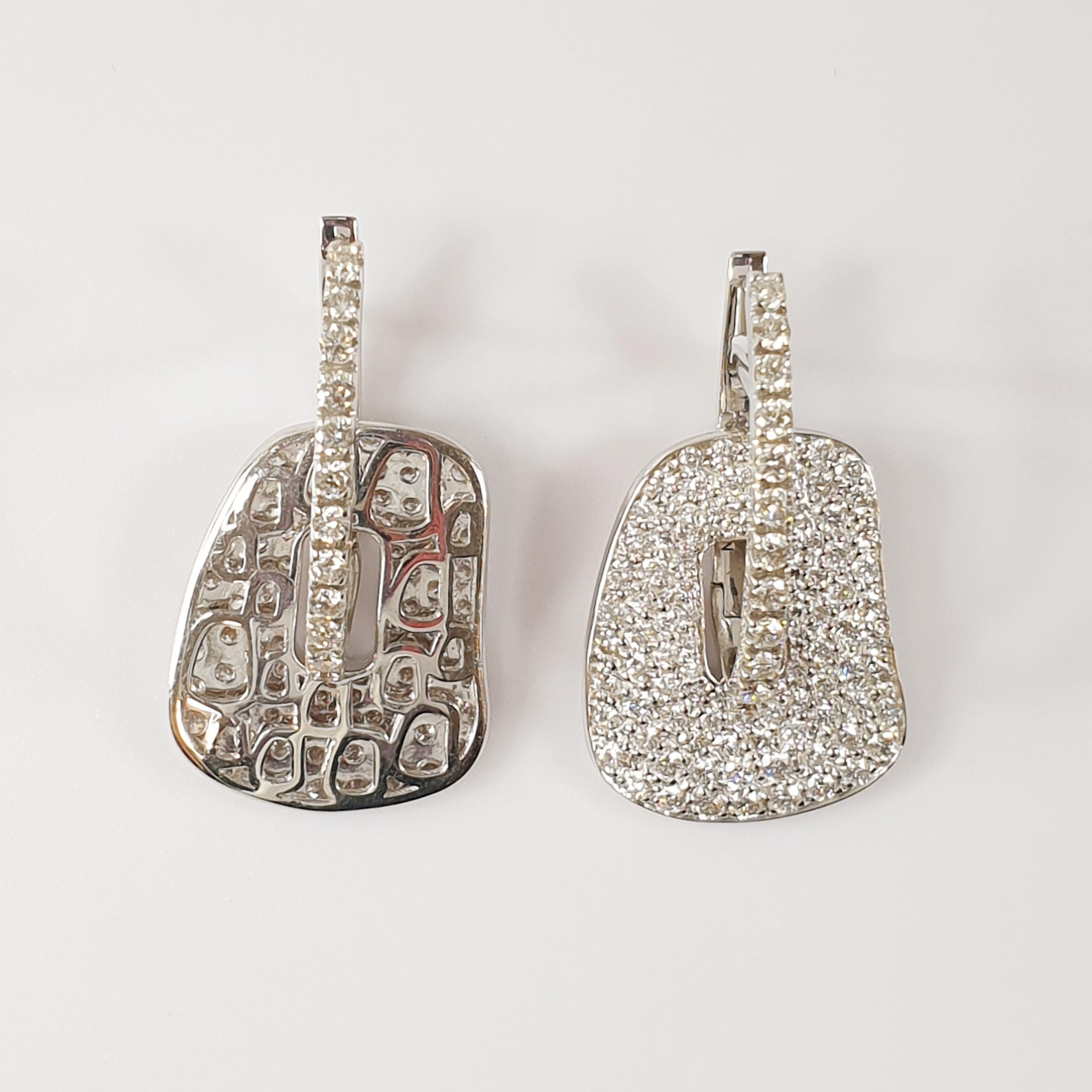 Mattioli Puzzle Collection 18k White Gold Pavé of Diamonds Earrings 
with two pairs of coloured puzzles to your choice 
Diamonds carat 1,78 ct
Weight 8,00gr 
Measure 20mm or 0.75 inches
Puzzle pendants of mother of pearl you can choose between 25