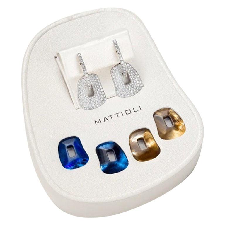 Mattioli, boucles d'oreilles puzzle en or blanc 18 carats avec pavé de diamants de la collection en vente