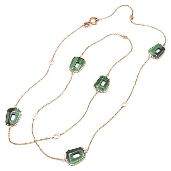 Mattioli Puzzle Collection 18 Karat Rose Gold and Malachite Necklace
Sizes 17 to 19cm upon request
Products available on request in yellow gold or white gold.
If not in stock, production time of thre-four weeks.
Also matching, earrings, pendant  and