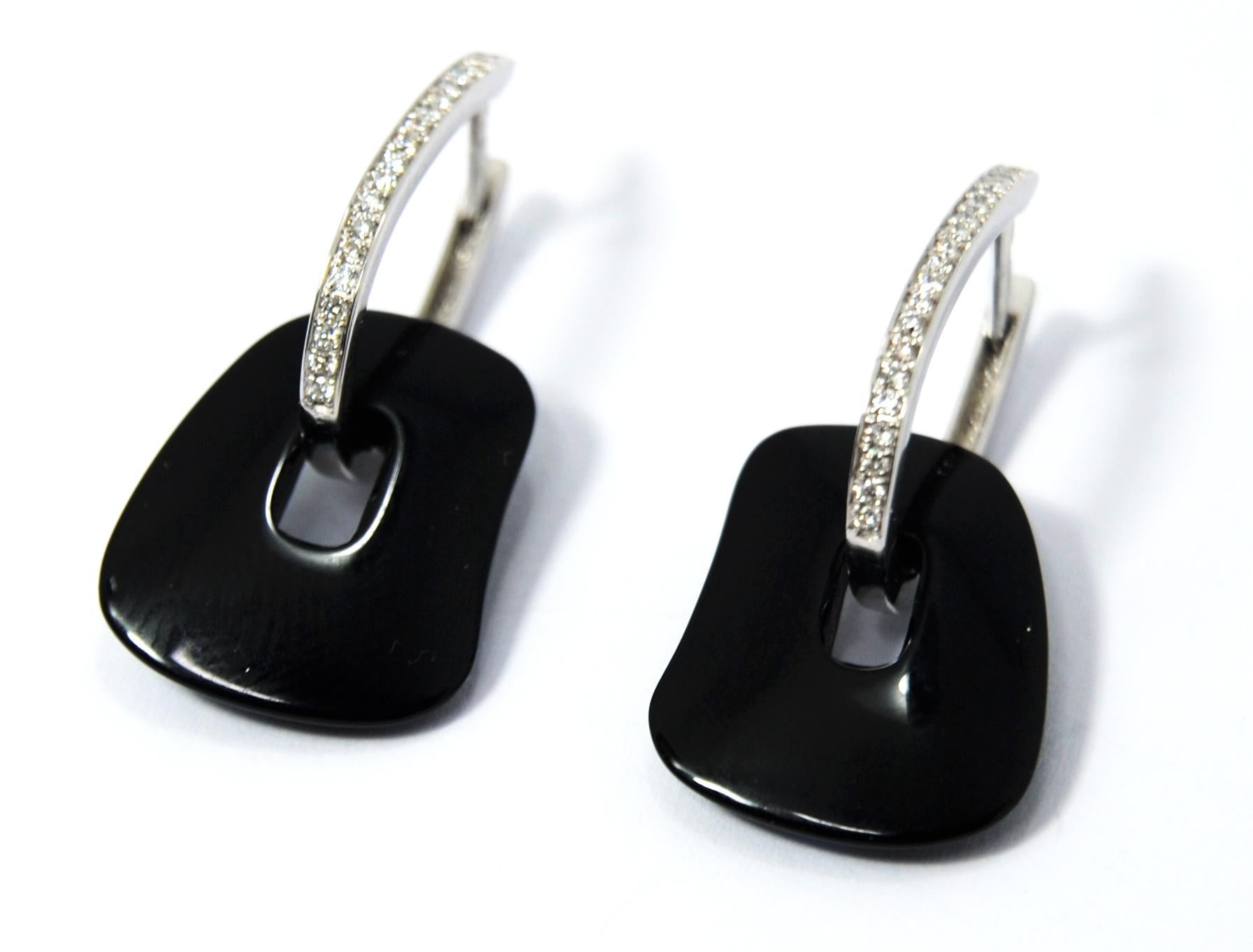 Earrings in  white or rose gold and Diamonds carat 0.34 ct
Weight 2.6gr  Measure 20mm or 0.75 inches
Puzzle pendants of mother of pearl you can choose between 25 colour palette 
The ones in the picture are onyx, white mother of pearl and pink mother