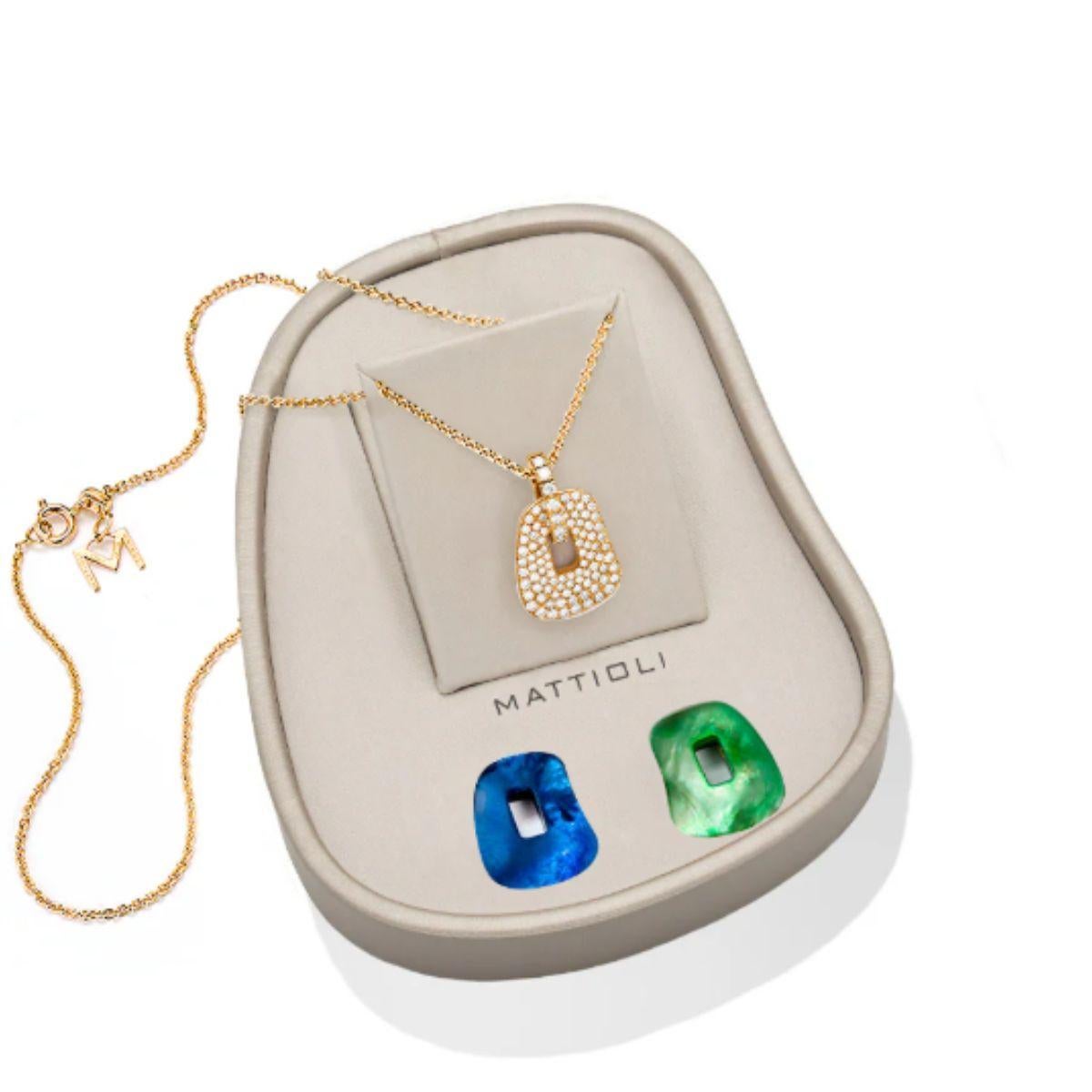 Puzzle small pendant in 18k rose gold, brown diamond pavé 0,89 cts. and two coloured puzzles - 45 cm - Dimensions: 15 x 18 mm

PRODUCTION TIME 4 WEEKS
Also matching, earrings, pendant  and necklace

Joyful, colourful, whimsical are all defining