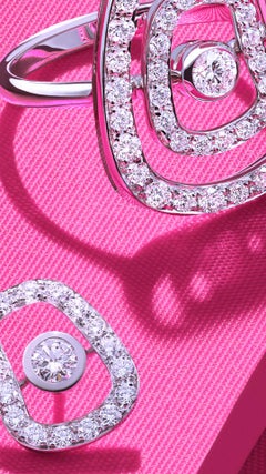 Mattioli Puzzle Diamonds Stud Earrings in White Gold and white diamonds.
