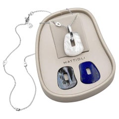 Mattioli Puzzle Medium Pendant in 18k White Gold and three puzzles