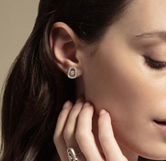 Colección de anillos Puzzle de Mattioli en oro rosa de 18 quilates y nácar natural
