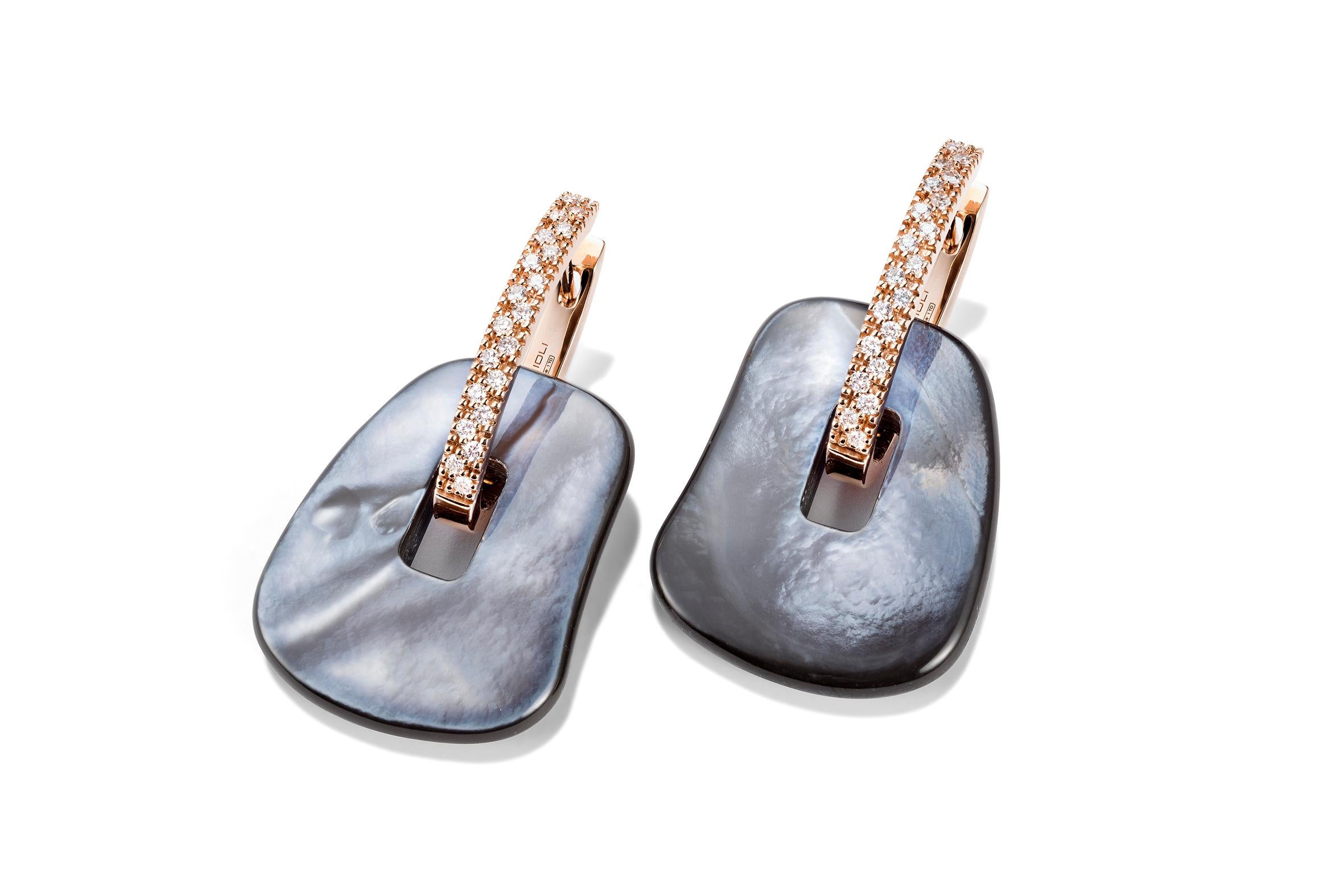 Mattioli Puzzle Safari Medium 18K Rose Gold Earrings Brown Enamel w/White Diamonds
Also available in Brown Diamonds
Earrings in rose gold 
Diamonds carat 0.40 ct
Weight 19.60 gr  Measure 22x27mm or 0.75 inches
Puzzle pendants of mother of pearl you