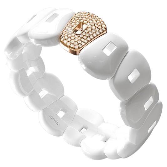 Expandible and Flexible, Adaptable 
Mattioli Puzzle Ceramic Collection 18K  Gold Bracelet
Option White or Black CeramicBracelet in ceramic with one element in rose gold color
Sizes Small 15 cm, Medium 17 cm, Large 19 cm
Actually in stock  size