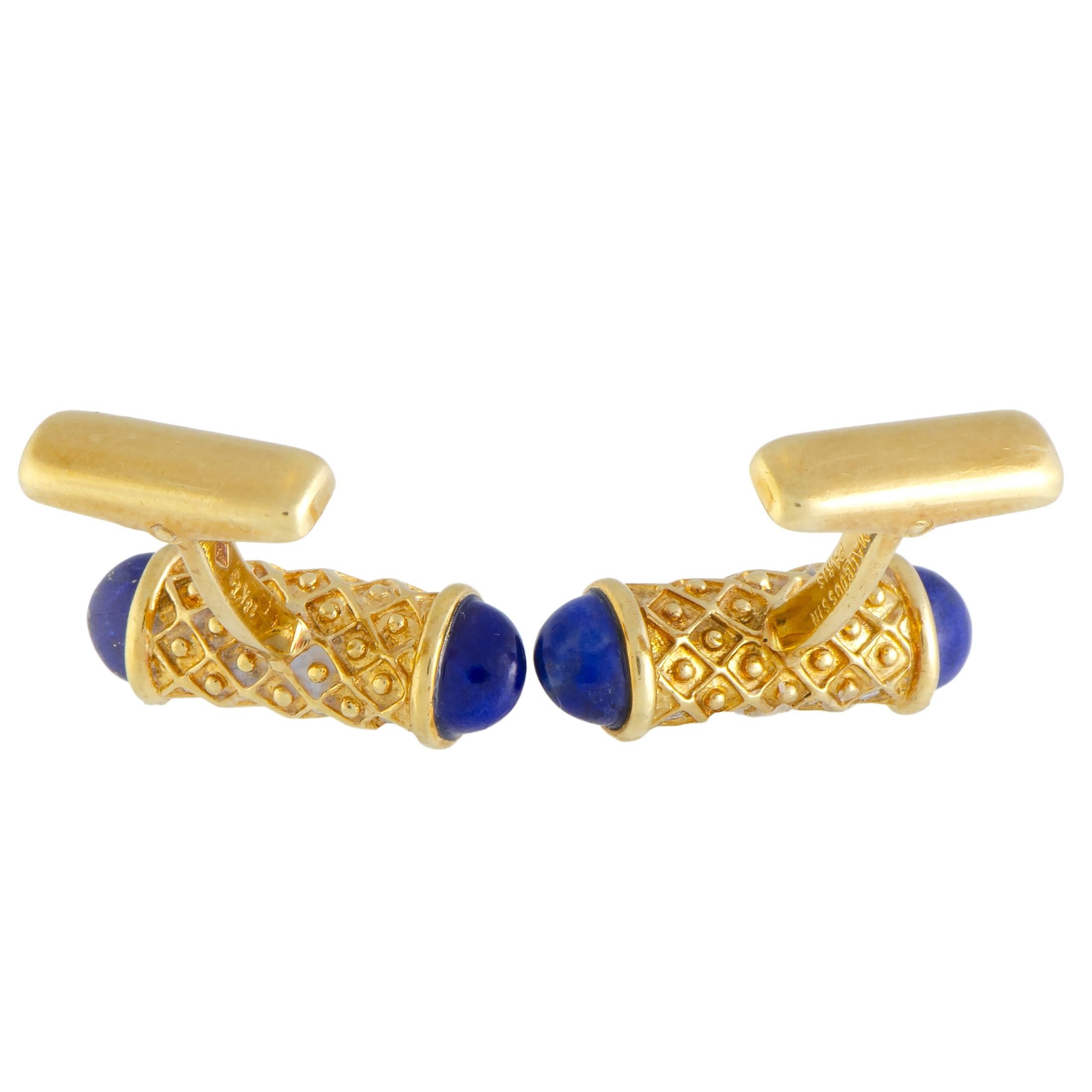 Featuring a remarkably elegant design, this charming pair of cufflinks by Mauboussin offers an alluringly classy appearance. The attractive pair is made of shimmering 18K yellow gold and set with the gorgeous lapis lazuli and 0.60ct of sparkling
