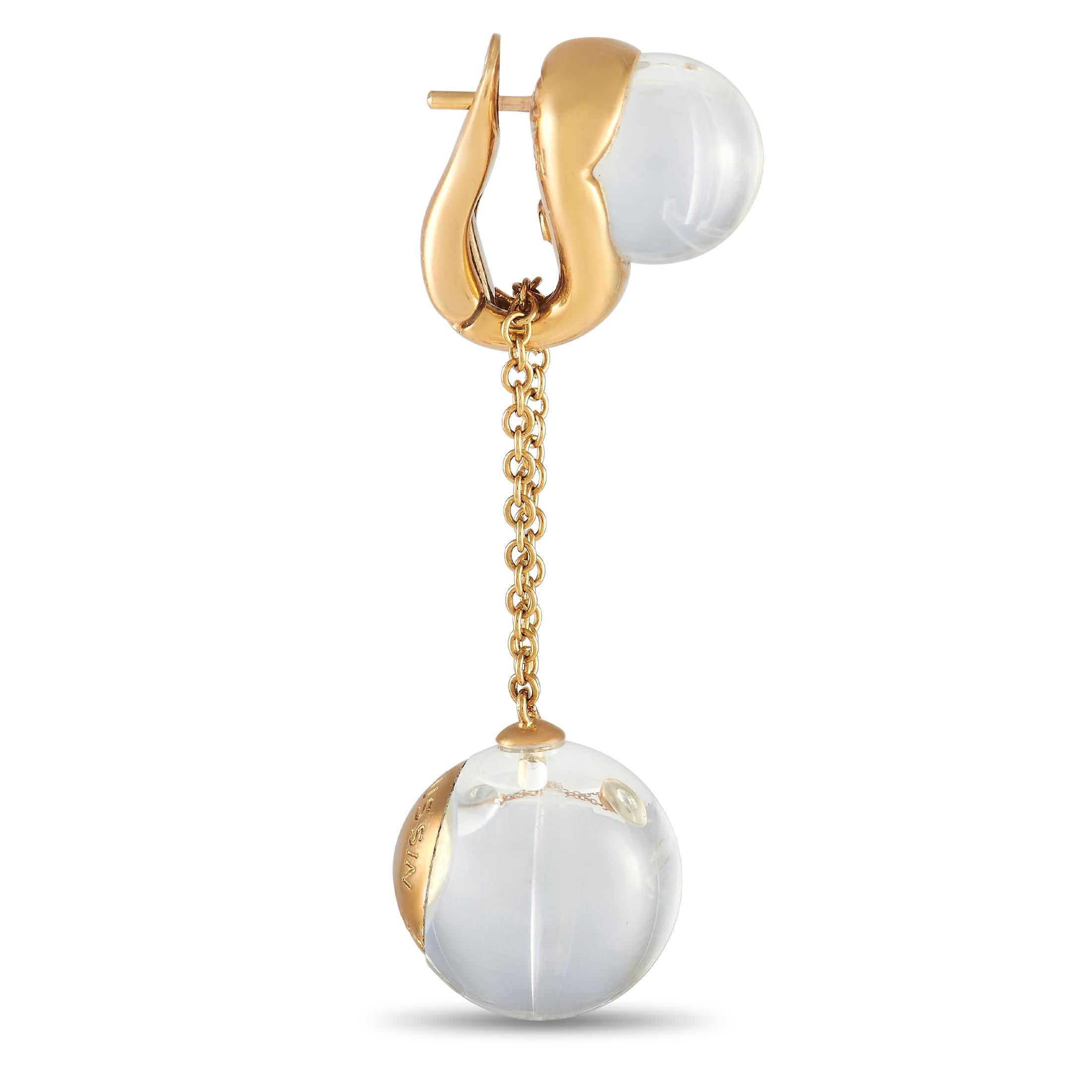 Here is a lovely piece from the jeweler of emotions - Mauboussin. This pair of earrings in 18K yellow gold feature a pear-shaped frame securing a rock crystal stud and a rock crystal drop. Both are dotted with a single diamond for that understated