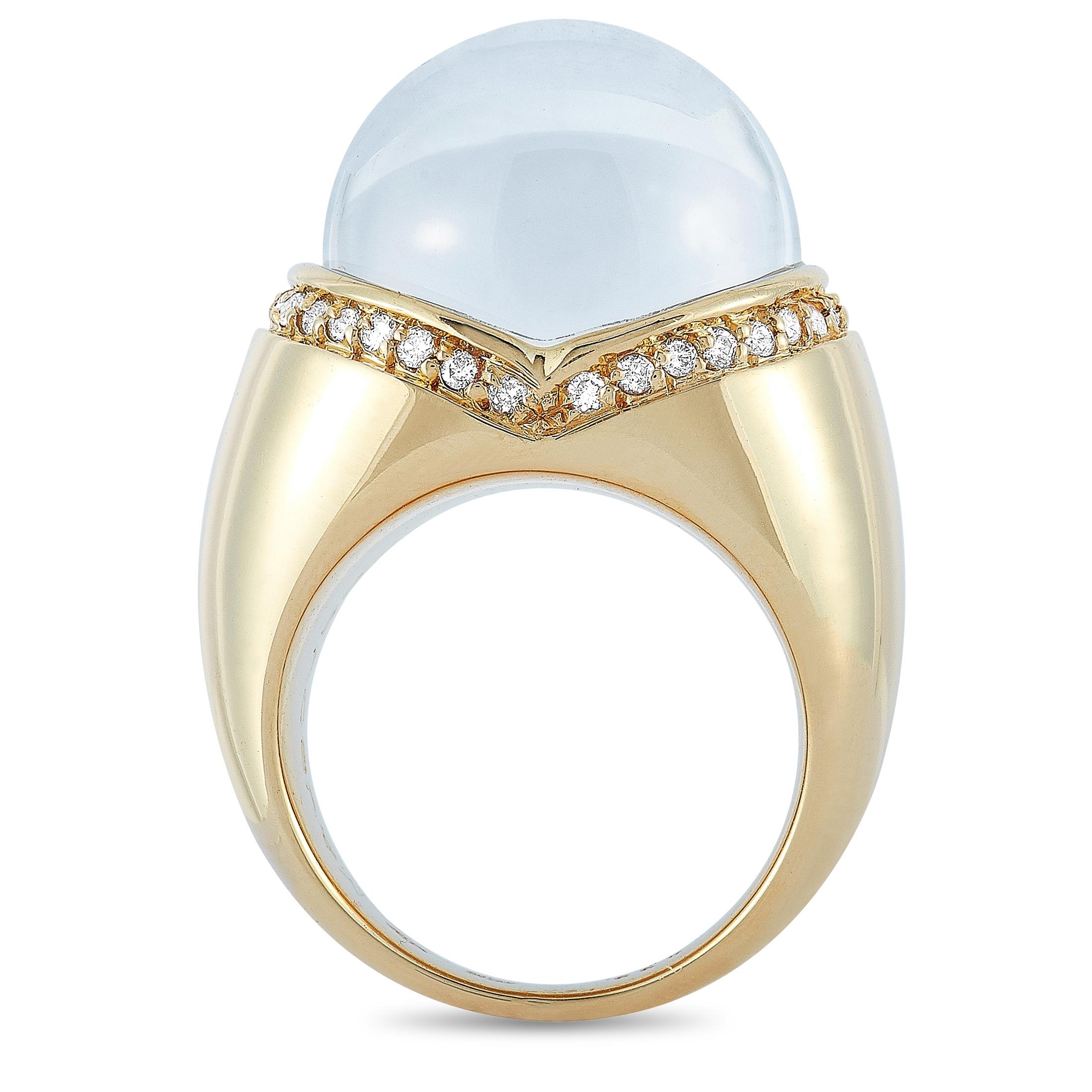 This Mauboussin ring is made of 18K yellow gold and embellished with diamonds and a rock crystal. The ring weighs 22.5 grams and boasts band thickness of 3 mm and top height of 15 mm, while top dimensions measure 19 by 15 mm.
Ring Size: 6

Offered