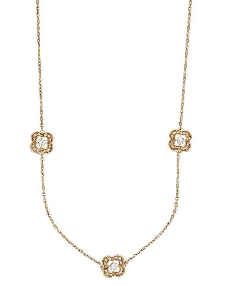 15 floral quatrefoils with lustrous diamonds adorn this necklace. This piece will immediately add grace and elegance to any occasion.

METAL TYPE: 18K Yellow Gold
STONE WEIGHT: 2.38ct twd
TOTAL WEIGHT: 17.8g
CHAIN LENGTH: 36.5