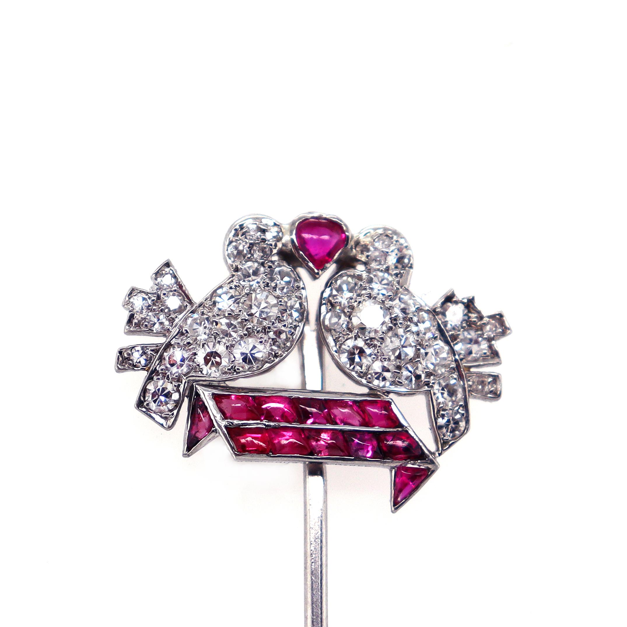 Mauboussin Art Deco Ruby and Diamond Lovebirds Pin, ca. 1920s

A very romantic Art Deco pin from the 1920s by the Parisian jeweller Mauboussin. This pin features two beautiful love birds kissing each other and creating a heart made out of ruby. Both