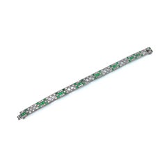 Pulsera Mauboussin Art Decó de esmeraldas y diamantes en platino, años 20