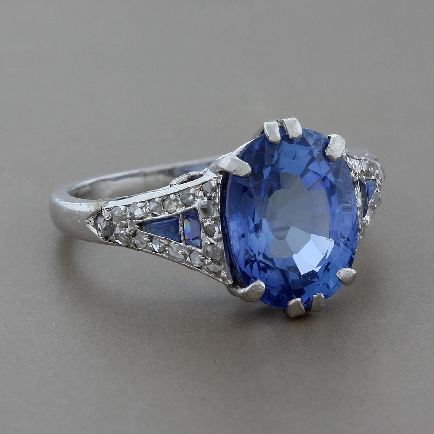 An exceptionally designed ring by designer Mauboussin. A 3.15 carat oval cut blue sapphire is adorned by 0.30 carats of diamonds and blue sapphires in a very special platinum setting

Currently ring size 5.75
