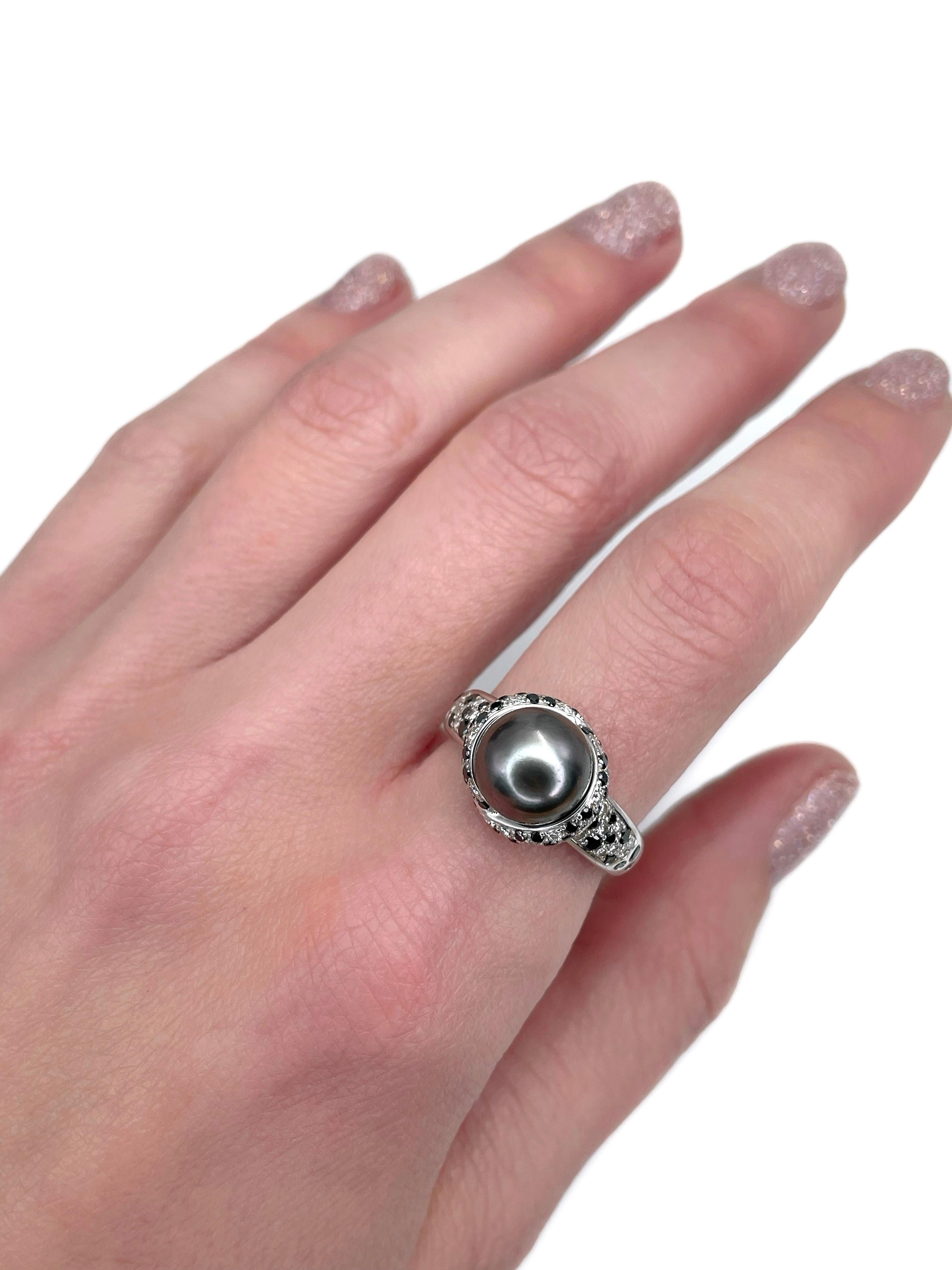 This is an amazing ring designed by Mauboussin for the “Caviar Mon Amour” collection. Circa 2000. 

It is crafted in 18K white gold. The piece features:
- 1 cultured Tahitian pearl
- 34 diamonds (round brilliant cut, TW 0.17ct, RW-W, VS-SI)
- 53