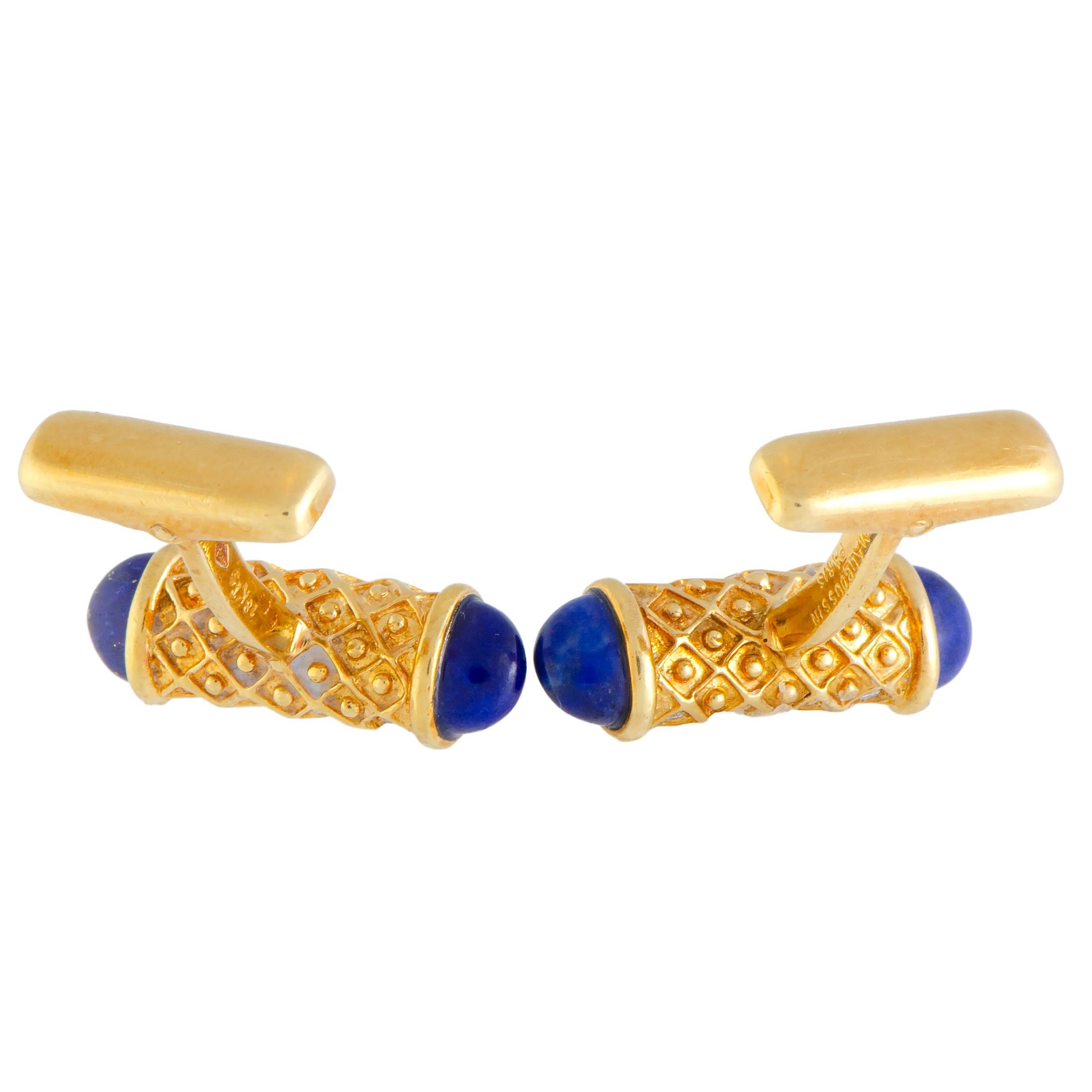 Featuring a remarkably elegant design, this charming pair of cufflinks by Mauboussin offers an alluringly classy appearance. The attractive pair is made of shimmering 18K yellow gold and set with the gorgeous lapis lazuli and 0.60ct of sparkling