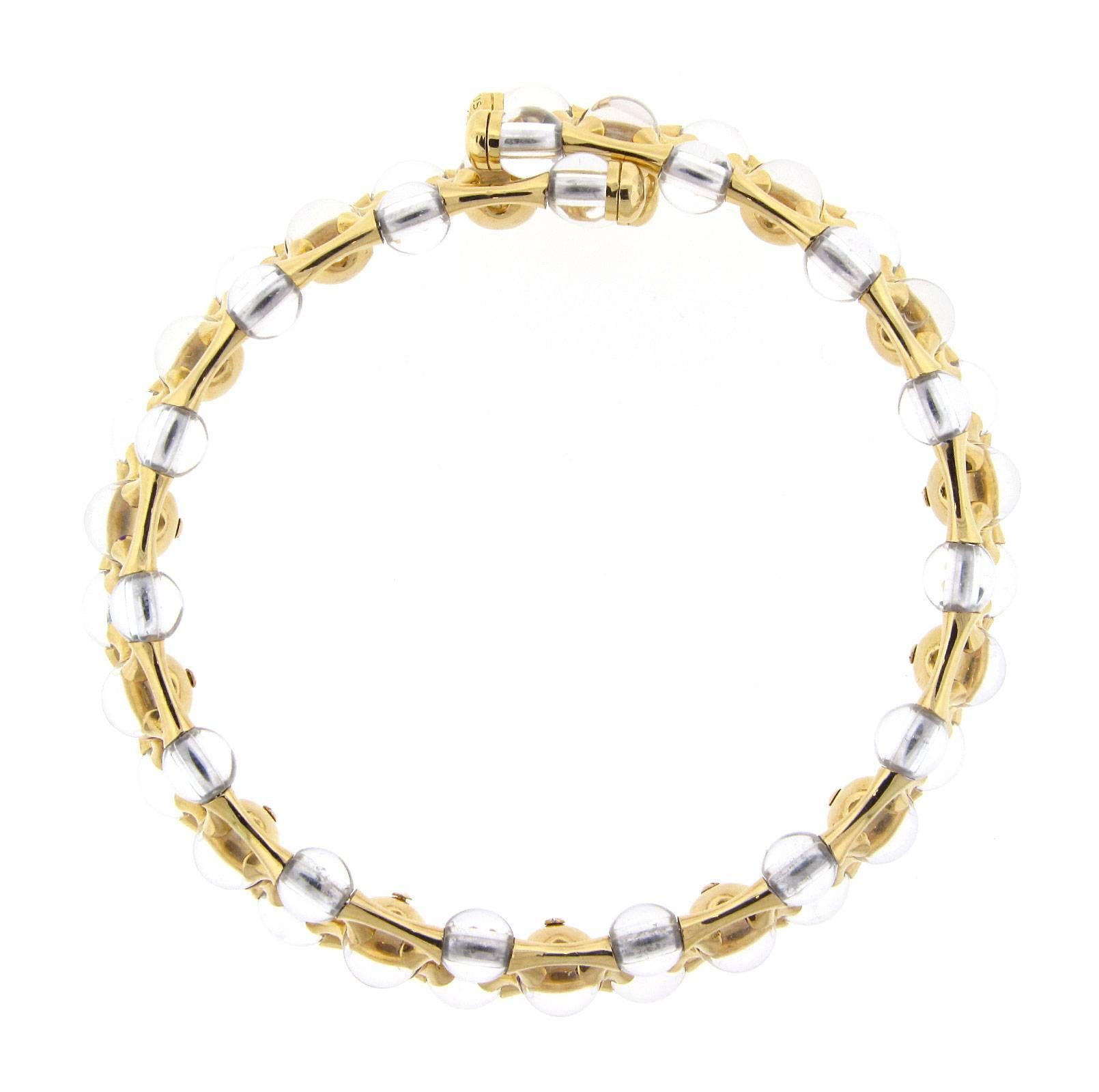 Mauboussin Halskette mit Diamanten und Bergkristallen. Die Halskette ist 15 Zoll lang, besteht aus 18 Karat Gelbgold und wiegt 122,1 DWT (ca. 189,89 Gramm). Außerdem hat er neun runde Diamanten. Außerdem ist er mit dem Stempel 