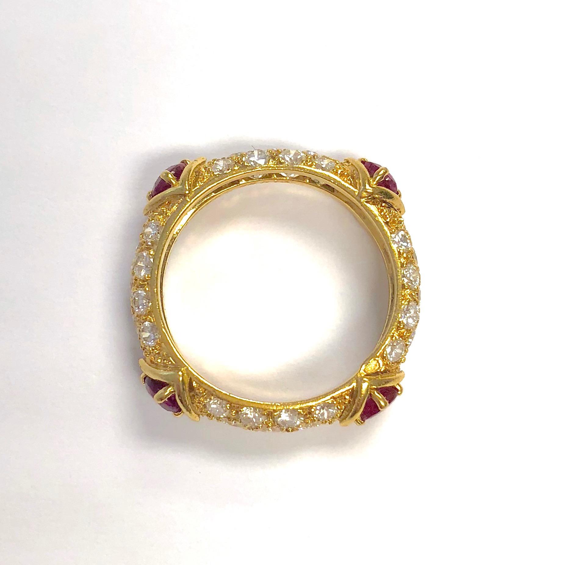 18K yellow gold pave' set diamond band with four rubies. 
Marked: MAUBOUSSIN PARIS and the serial number and the french 18K gold hallmark 
Total diamond weight: 1.1 carats 
Total emerald weight: 0.70 carats 
Size: 6.25 
Weight: 4.6 grams