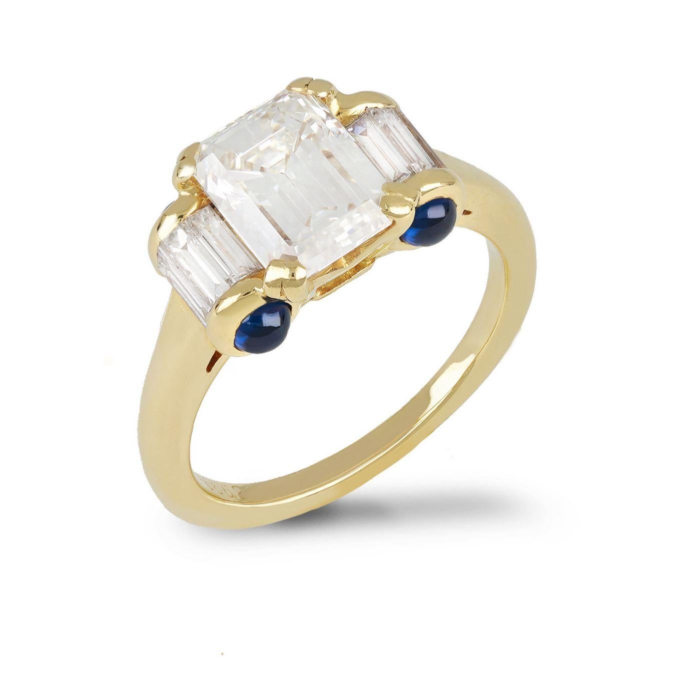 Mauboussin diamond and sapphire ring. Set to centre with an octagonal emerald-cut diamond, G colour, SI1 clarity, with a weight of 2.01 carats in an open back claw setting, flanked by six baguette cut diamonds in open back channel settings with a