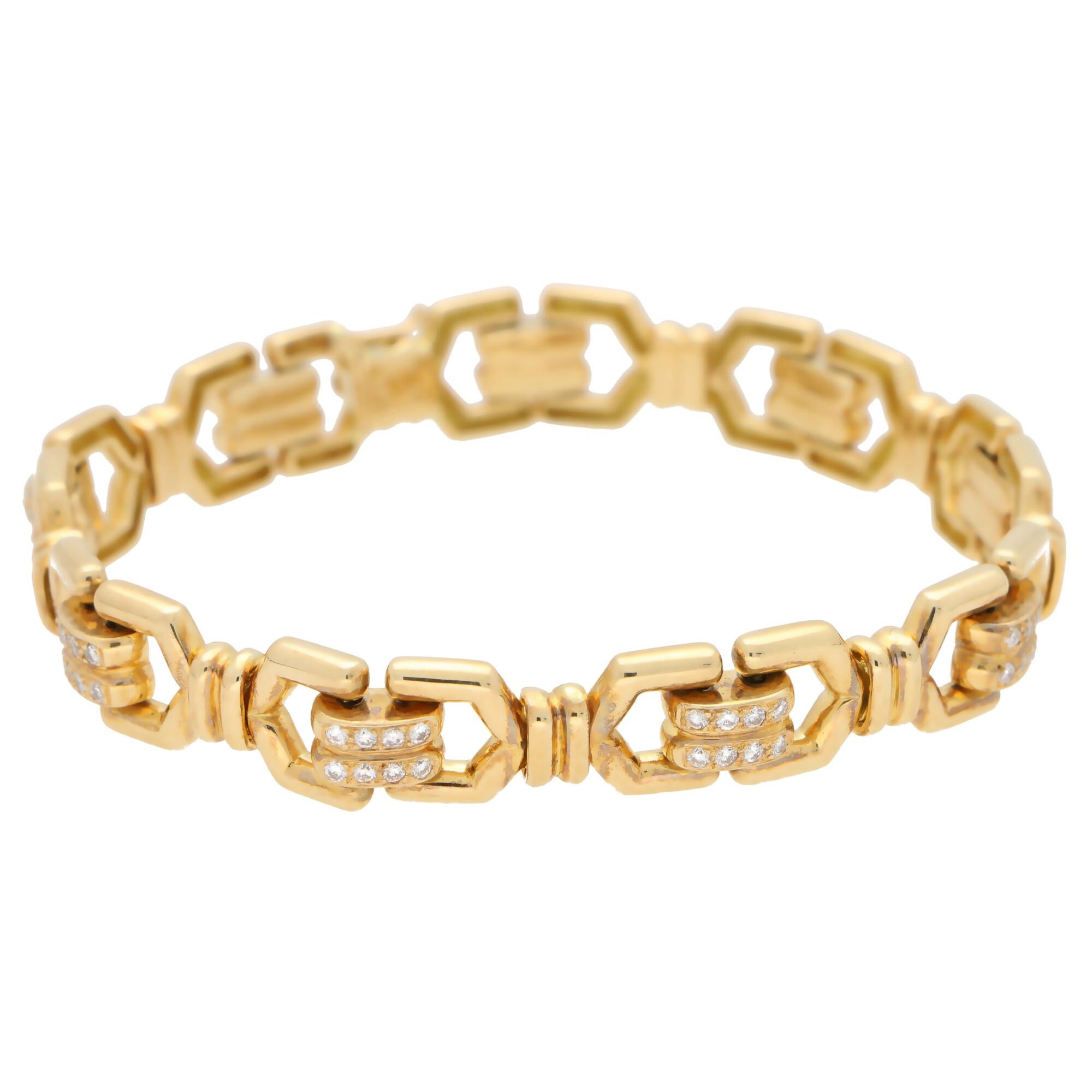 A lovely signed Mauboussin diamond chain link bracelet set in 18k yellow gold.

The bracelet is composed of nine beautifully crafted articulated links, all of which being centrally set with a pavé set diamond panel. 

Due to the links being