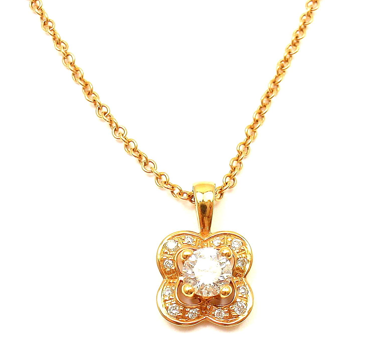 18k Rose Gold Diamond Flower Pendant Necklace by Mauboussin. 
With 1 round brilliant cut diamond VS1 clarity, G color total weight .30 ct
 12 round brilliant cut diamonds VS1 clarity, G color total weight .24ct
Details:
Measurements: Length:
