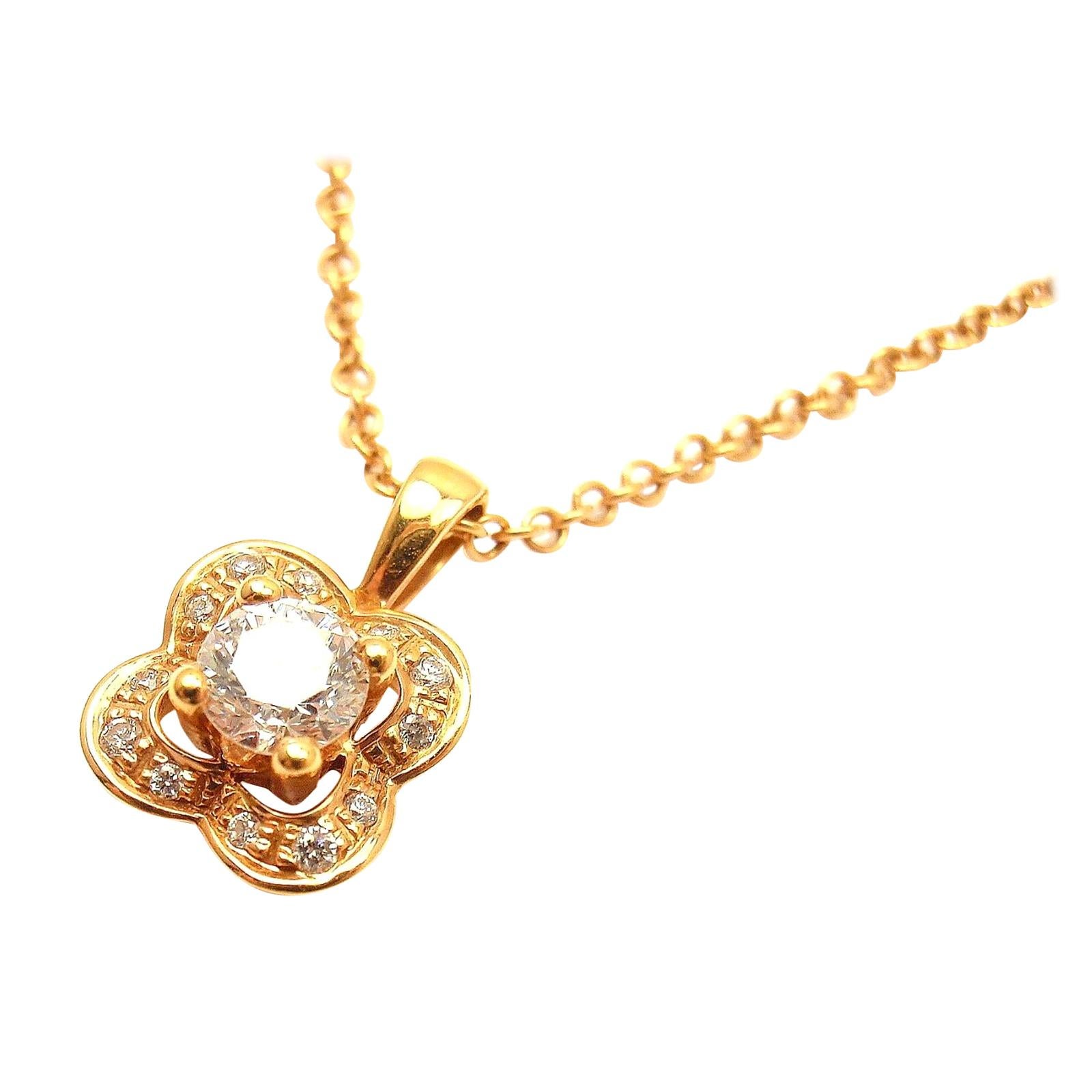 Mauboussin Collier pendentif fleur en or rose et diamants en vente