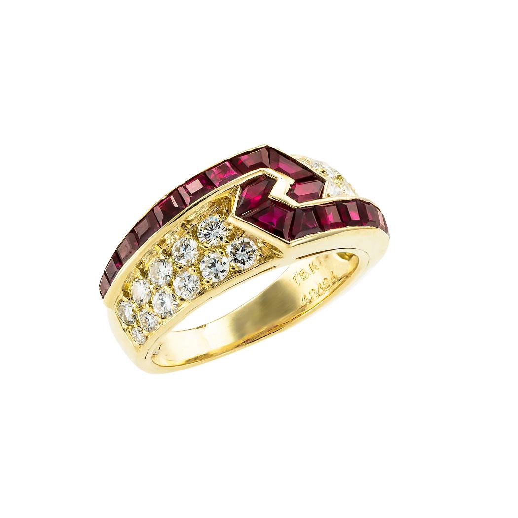 Mauboussin ruby diamond and yellow gold ring circa 1980. *

SPECIFICATIONS:

DIAMONDS:  twenty-two round brilliant-cut diamonds totaling approximately 0.95 carat, approximately F-G color, VVS clarity.

GEMSTONES:  calibrated rubies totaling