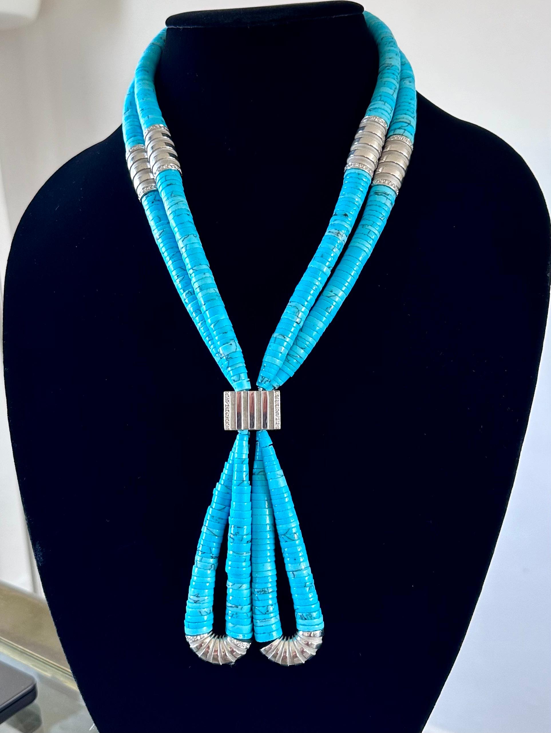 Statement Necklace by Mauboussin
18K White Gold & Diamonds
Mauboussin 'Nadja' Turquoise Diamond 18k White Gold Necklace. 
The Nadja necklace is designed as two strands of natural turquoise beads accented by fluted white gold elements  polished with