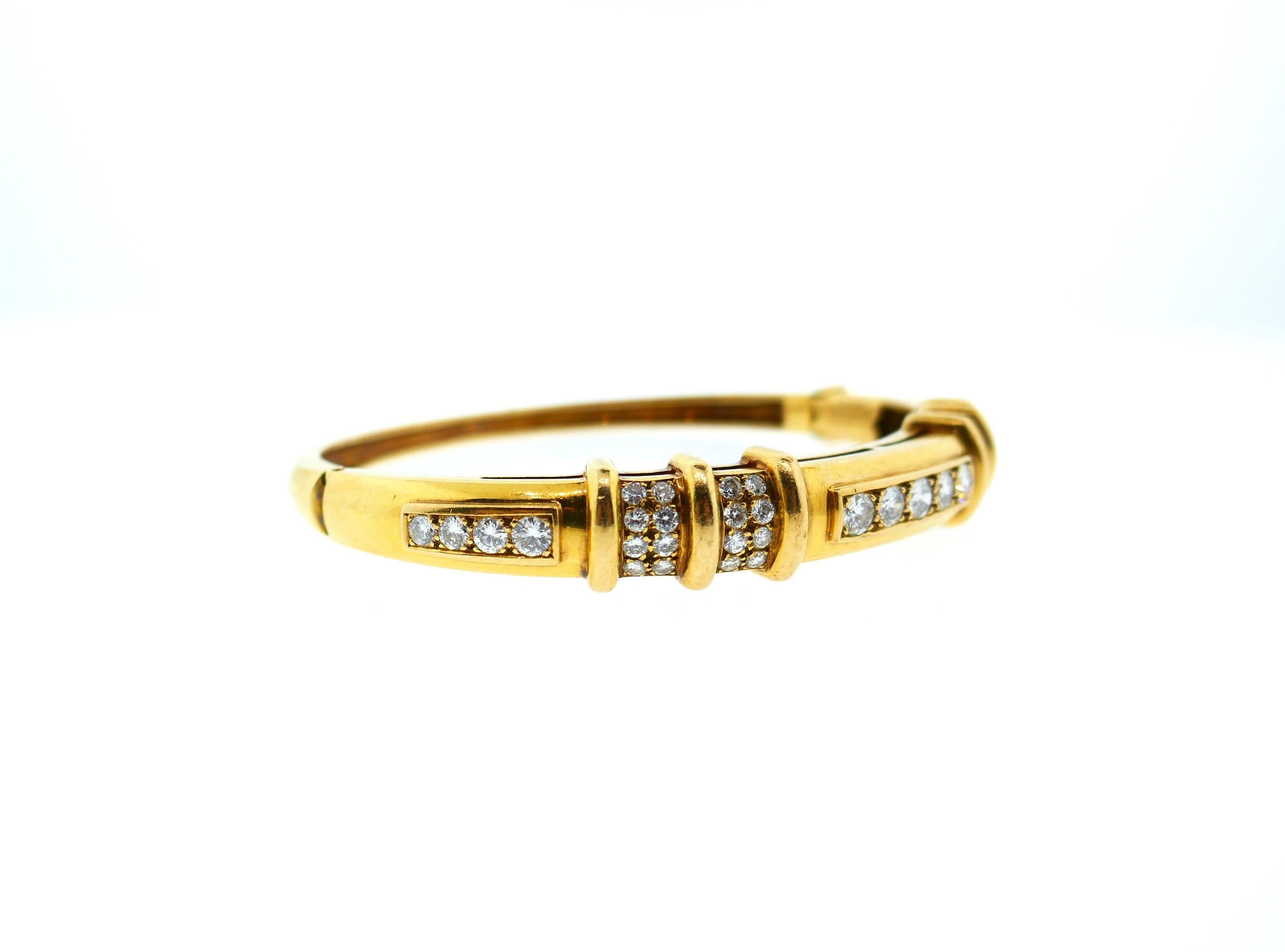Mauboussin French 18 Karat Yellow Gold Diamond Bangle

This is a beautiful and versatile Mauboussin yellow gold and diamond bangle. The bangle features over 1.5cts of excellent quality diamonds. 

Dimensions: Will fit a medium wrist (6.75