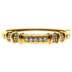 Mauboussin Bracelet jonc français en or jaune 18 carats et diamants