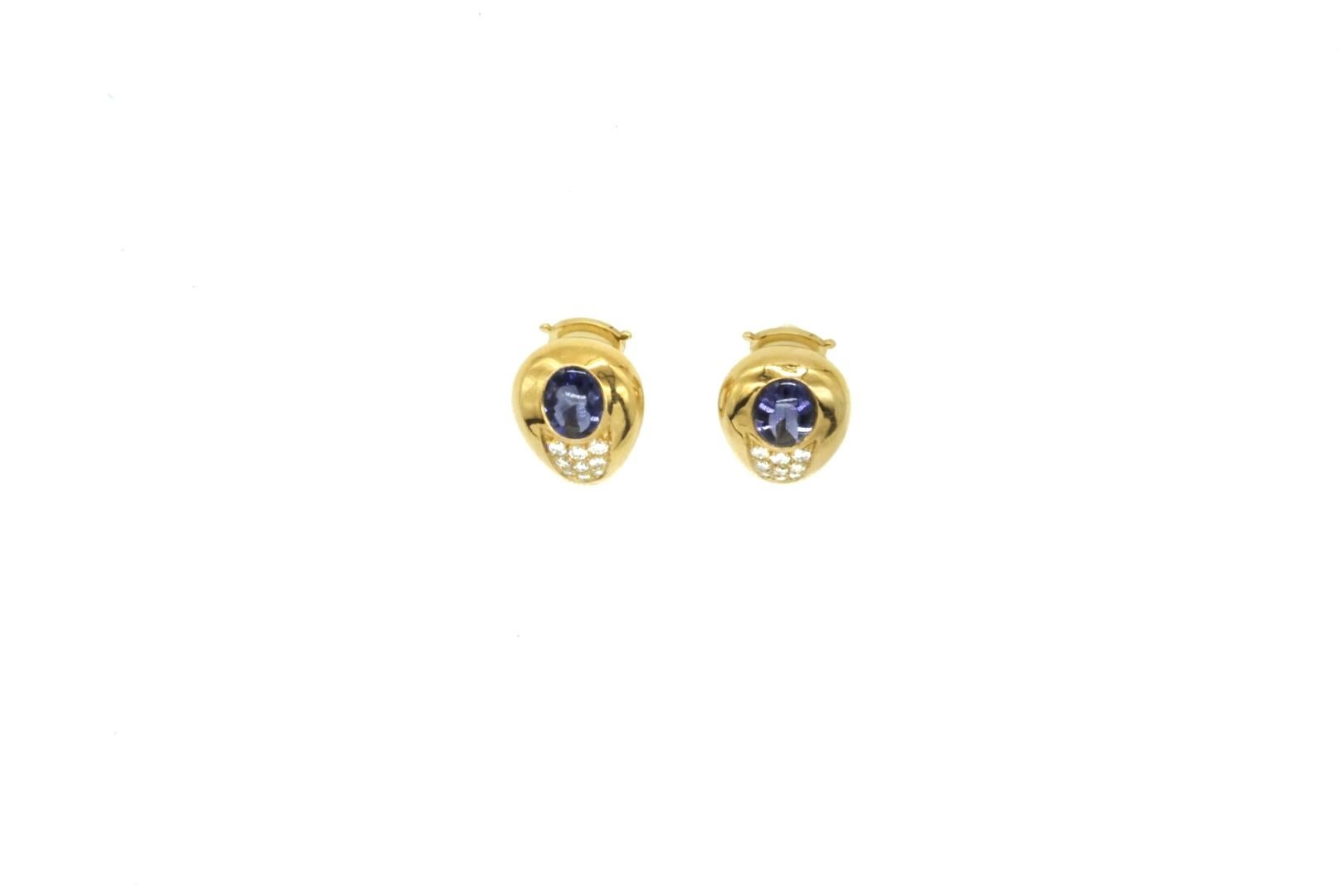 Mauboussin iolite and diamond earclips mounted in 18k yellow gold. Made in France, circa 1970.