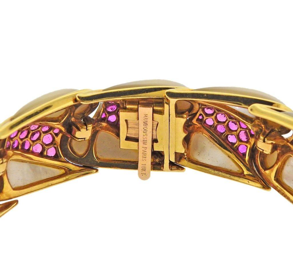18K Gold Bracelet by Mauboussin. Set with mother of pearl & approx 1.70ctw in rubies.  Bracelet will comfortably fit up to 6.75
