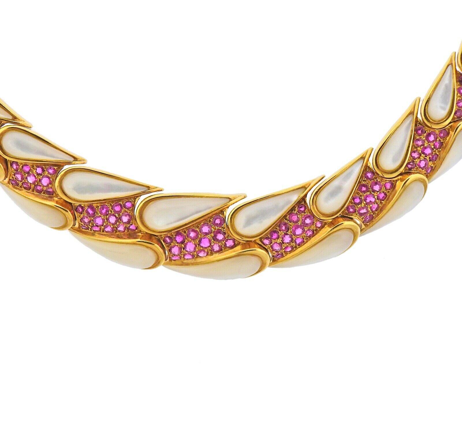 18K Gold Necklace by Mauboussin. Set with moonstone & approx 2.50ctw in rubies. Necklace is 15