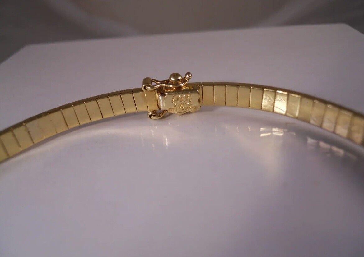 MAUBOUSSIN PARIS 18k Yellow Gold, Mother of Pearl & Sapphire Omega Bracelet 1980 For Sale 3
