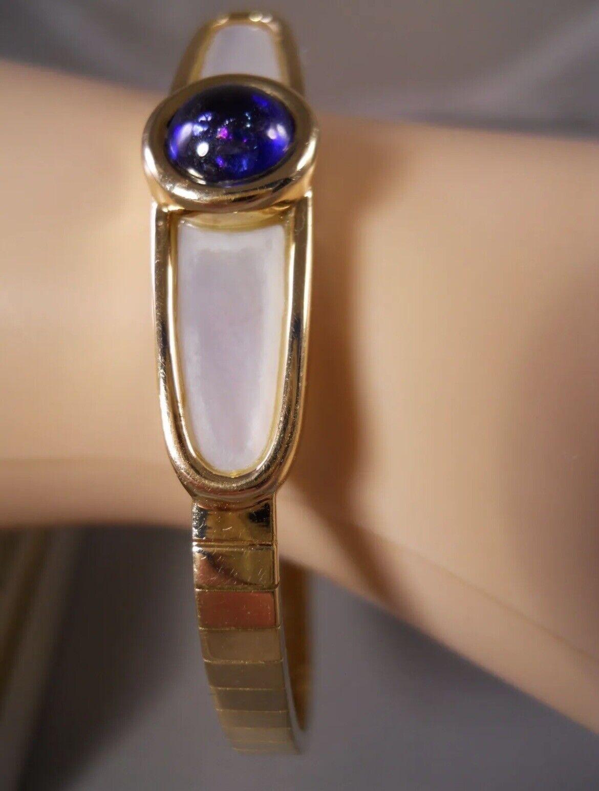 MAUBOUSSIN PARIS 18k Yellow Gold, Mother of Pearl & Sapphire Omega Bracelet 1980 For Sale 4