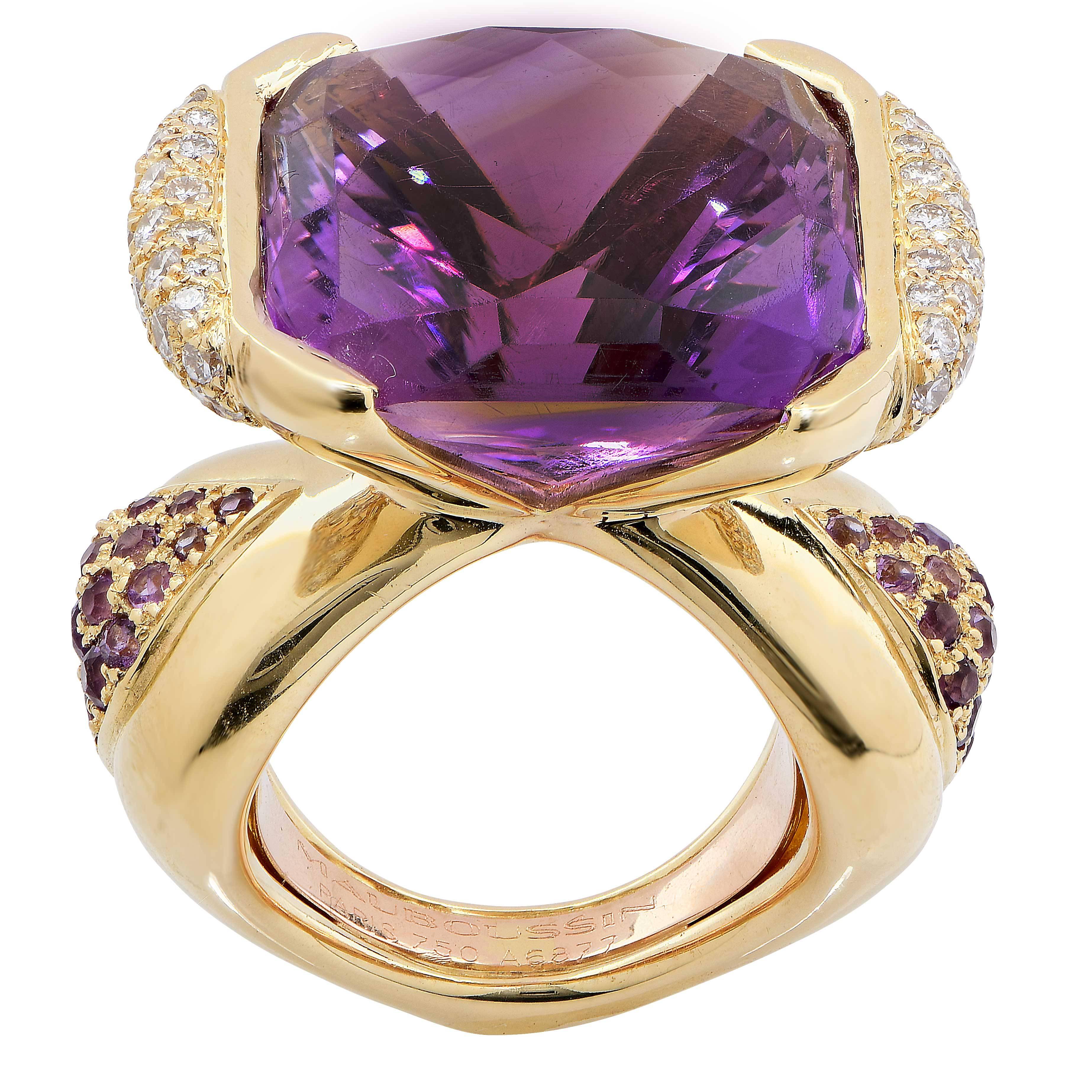 This wonderful design by Mauboussin, Paris features a modified cushion cut Amethyst which weighs approximately 20 carats and is flanked by triangular shaped panels pave set with 68 round brilliant cut diamonds with an estimated total weight of 1.4