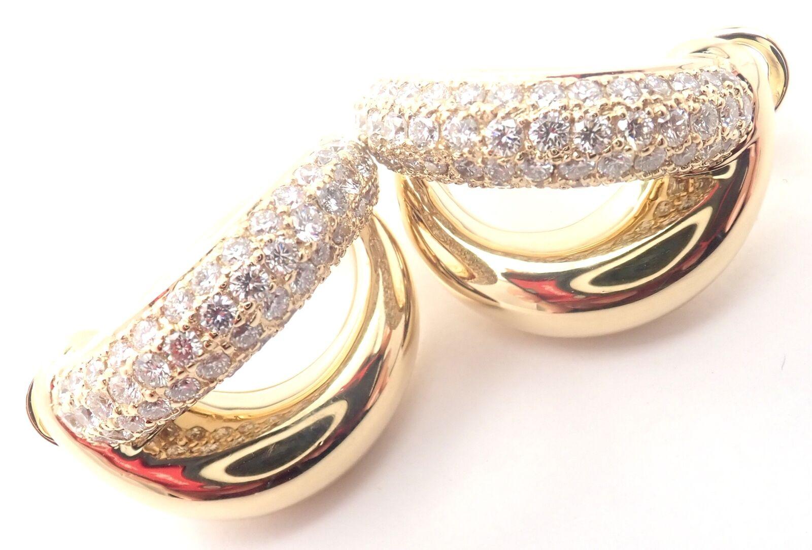 18k Yellow Gold Diamond Double Hoop Earrings by Mauboussin Paris. 
With Round Brilliant Cut Diamonds VS1 clarity, G color total weight approximately 2.3ct
****These earrings are for pierced ears.
Details:
Measurements: Hoop: 21mm x 15mm
Weight: 29.5