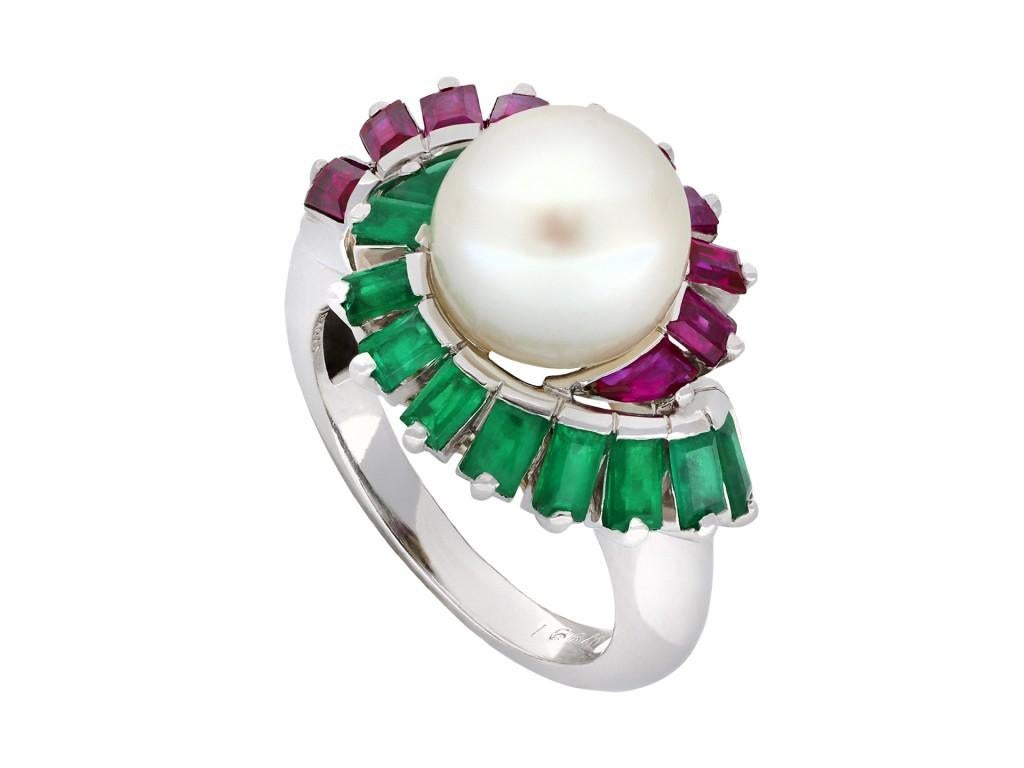Mauboussin pearl, ruby and emerald cluster ring. Set to centre with a natural saltwater button pearl in a half-drilled open back setting, approximately 9.2 x 9.3 x 7.7mm, further adorned with nine rectangular baguette cut natural unenhanced rubies