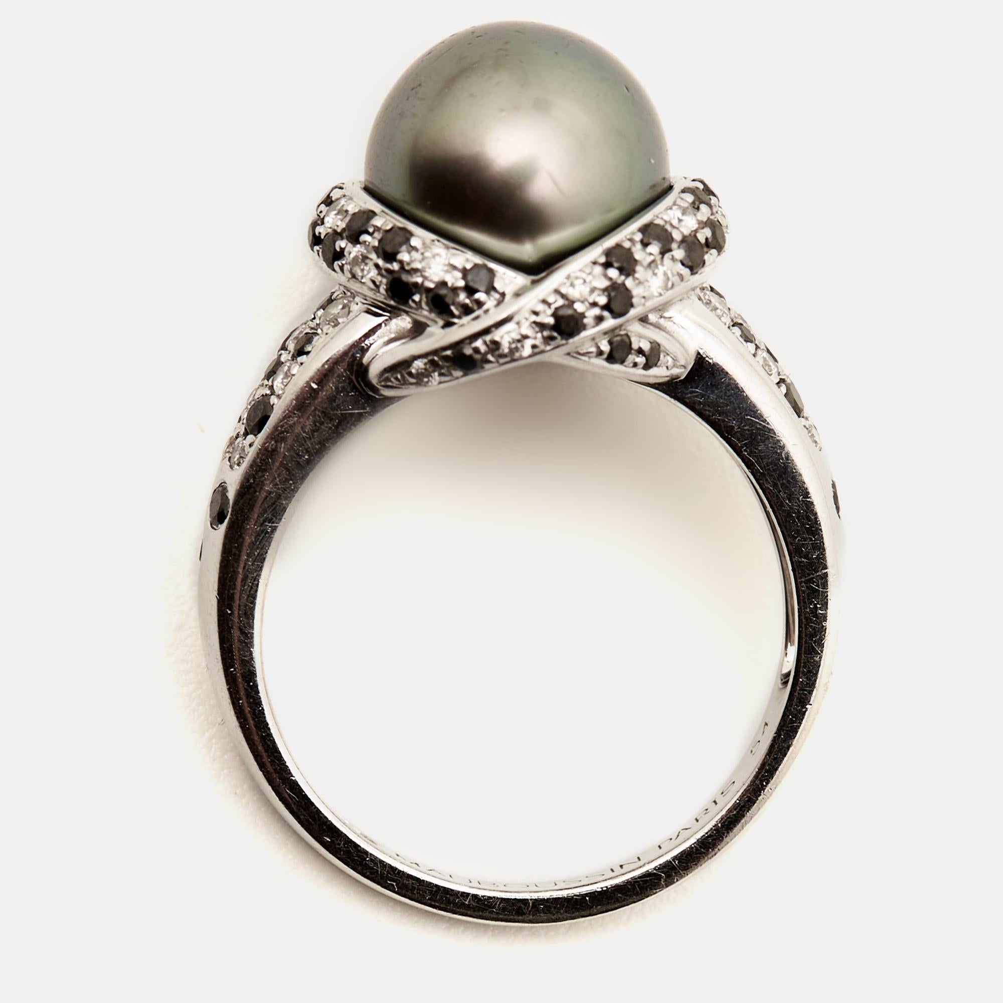 Experience the epitome of luxury and craftsmanship with this meticulously designed Mauboussin pearl ring. Its timeless elegance and exceptional detailing make it a statement piece for any occasion.

