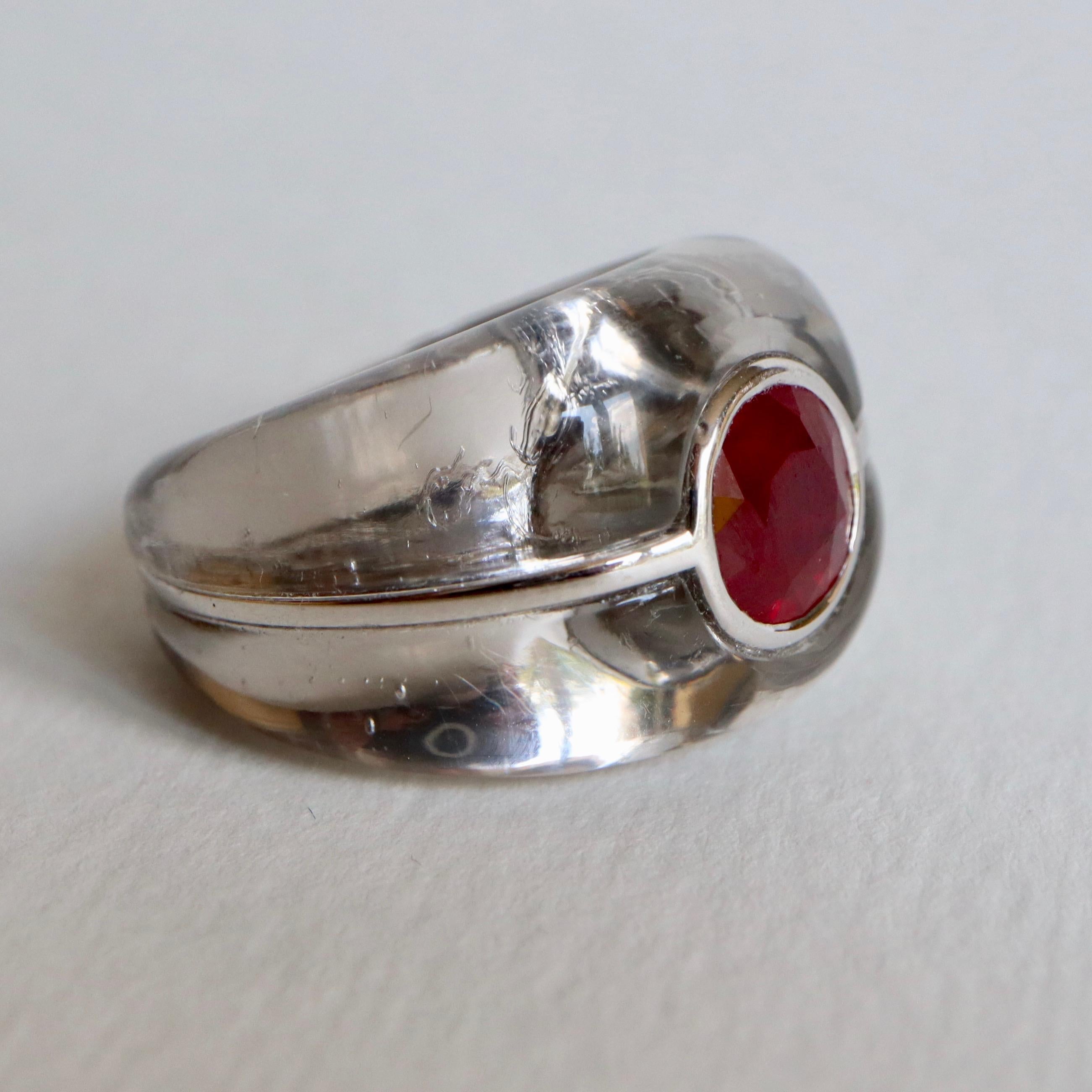 
MAUBOUSSIN Ring in Rock Crystal and 18 Carat White Gold and Ruby
Ruby Weight: approximately 3 Carats, Diameter 8.5 mm
GEM Paris Certificate: n ° 5A Burmese Ruby ​​heated Vitreous Filling
Signed MAUBOUSSIN PARIS and numbered
Diameter 16.5 Size 51 to
