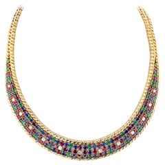 Collar Mauboussin de rubíes, esmeraldas, zafiros y diamantes, 18k