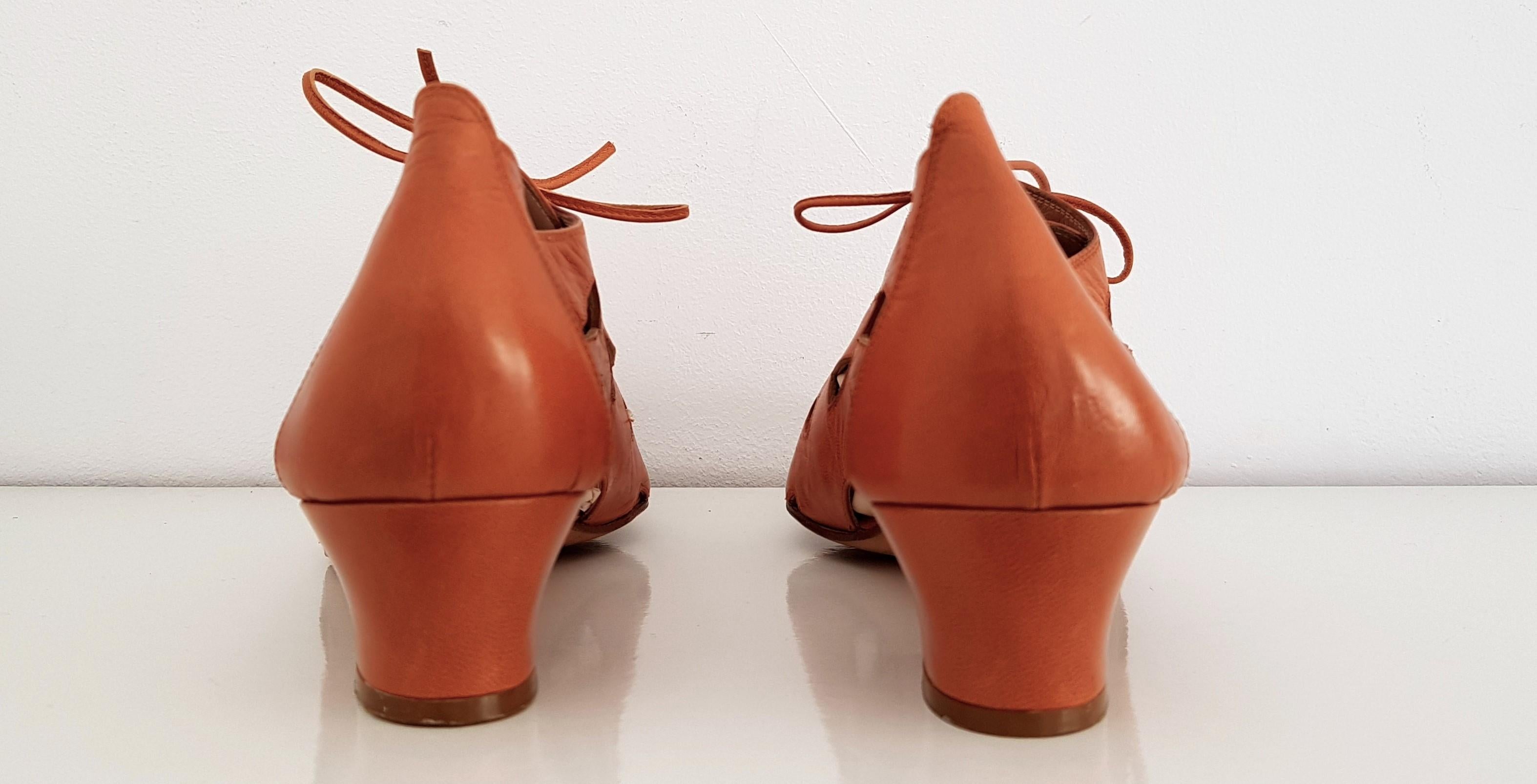 Maud Frizon Shoes with different designed holes. 
Color: Camel/Caramel 
Leather
Conditions: Great conditions, something marked on the sole but for the rest they are in perfect condition.
Heel height: 3.8 cm
Size 10 (US)
Made in Italy