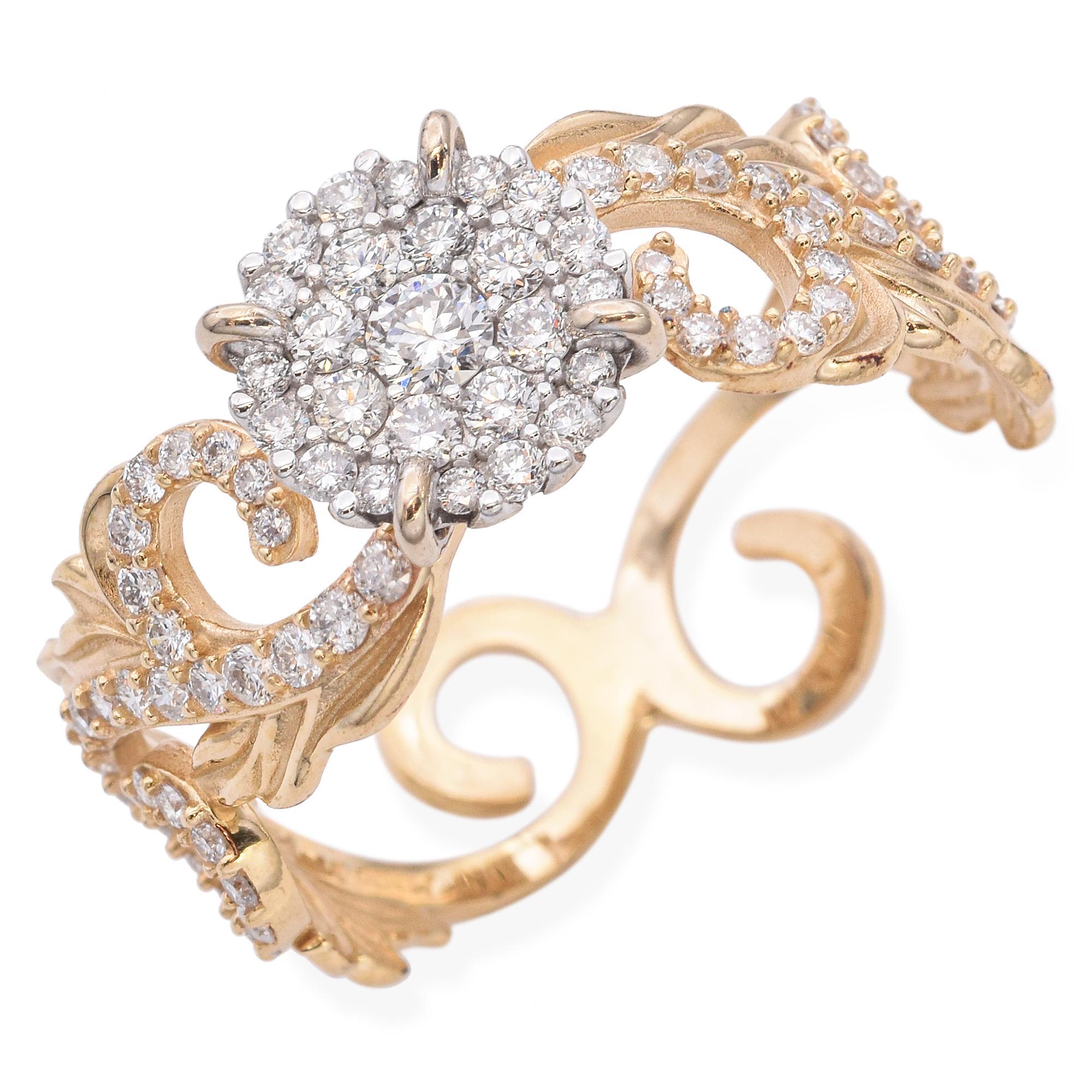 This intricate ring is crafted in gold. It features a central cluster of sparkling white diamonds, surrounded by a detailed design of swirling gold adorned with additional diamonds. The diamonds are set in a circular pattern, enhancing their