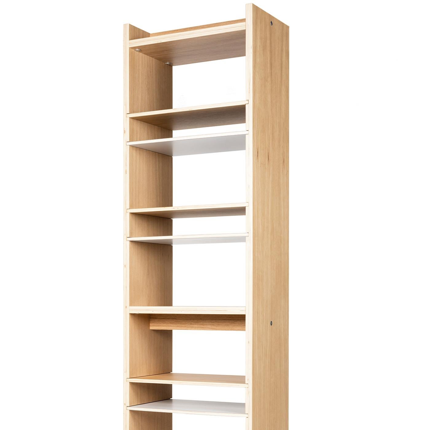 This freestanding and backless bookcase in oak plywood has a natural, water-based varnish to create clean, simple lines that will fit in seamlessly with any modern home or office decor. Showcase your favorite books and collectibles on the shelves,