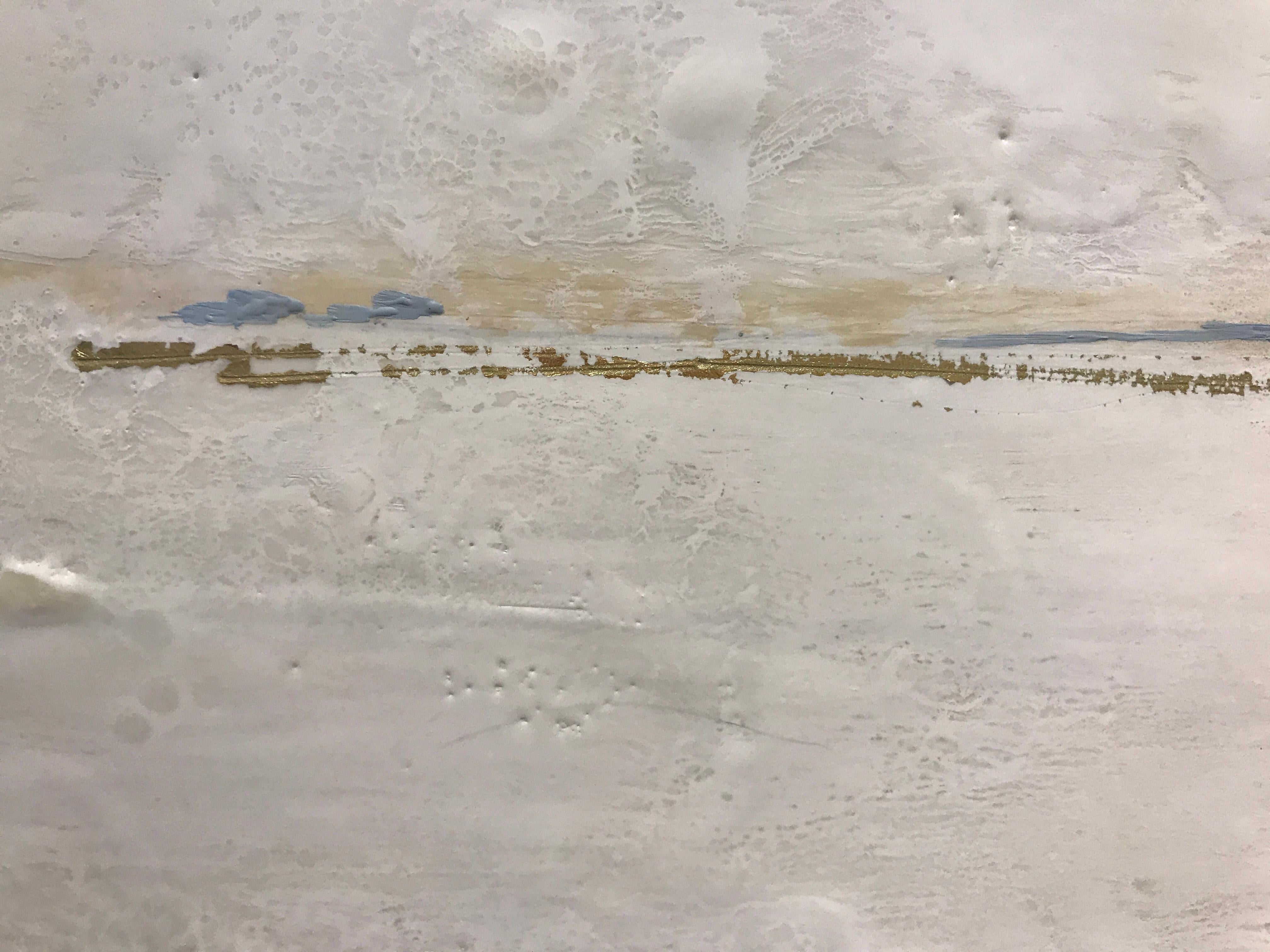 'Liquid White' is a large framed abstract encaustic and gold leaf on board painting created by American artist Maureen Naughton in  2018. Featuring a soft palette mostly made of white tones, delicately accented with light grey, blue, brown and gold,