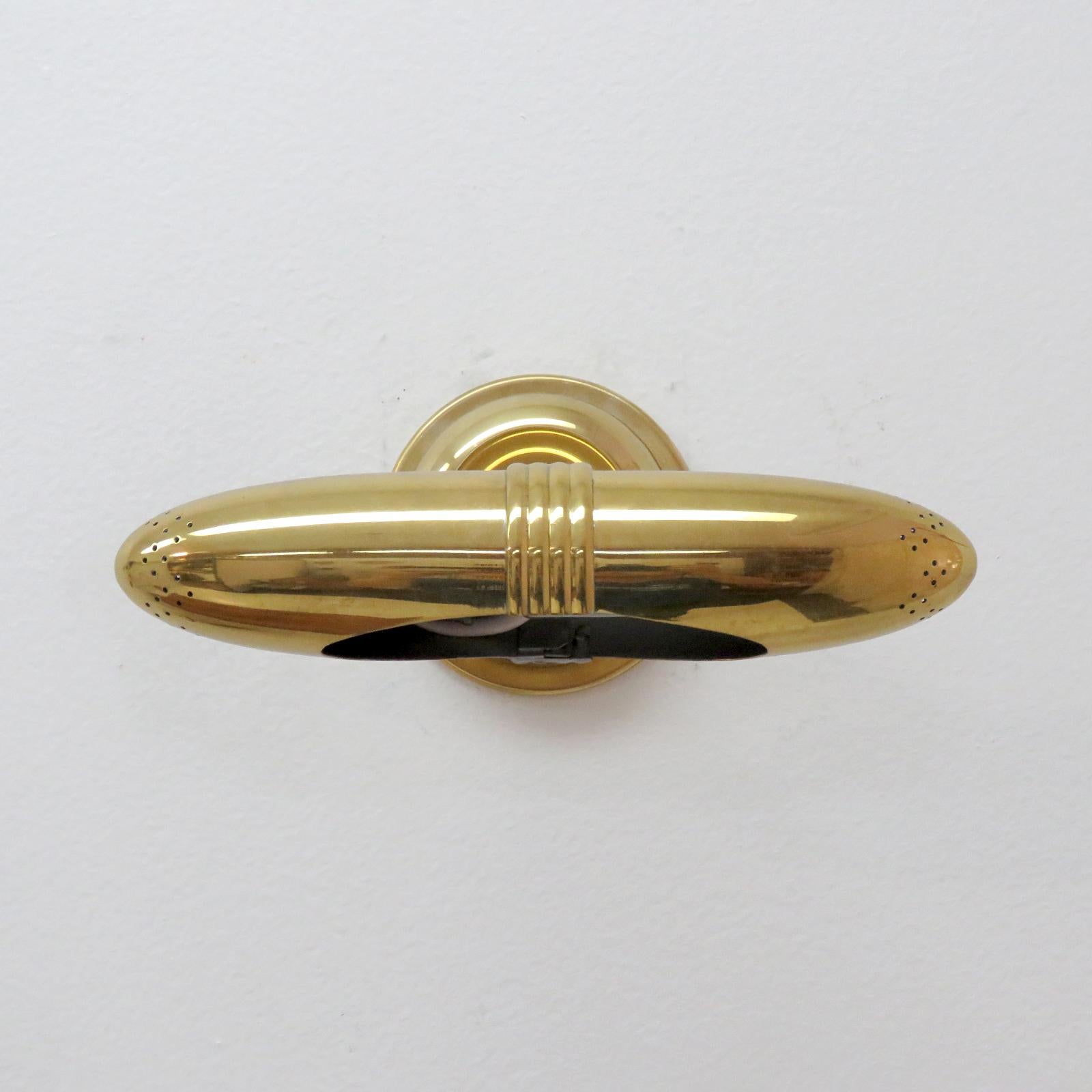 Maravillosos apliques articulados de latón modelo 