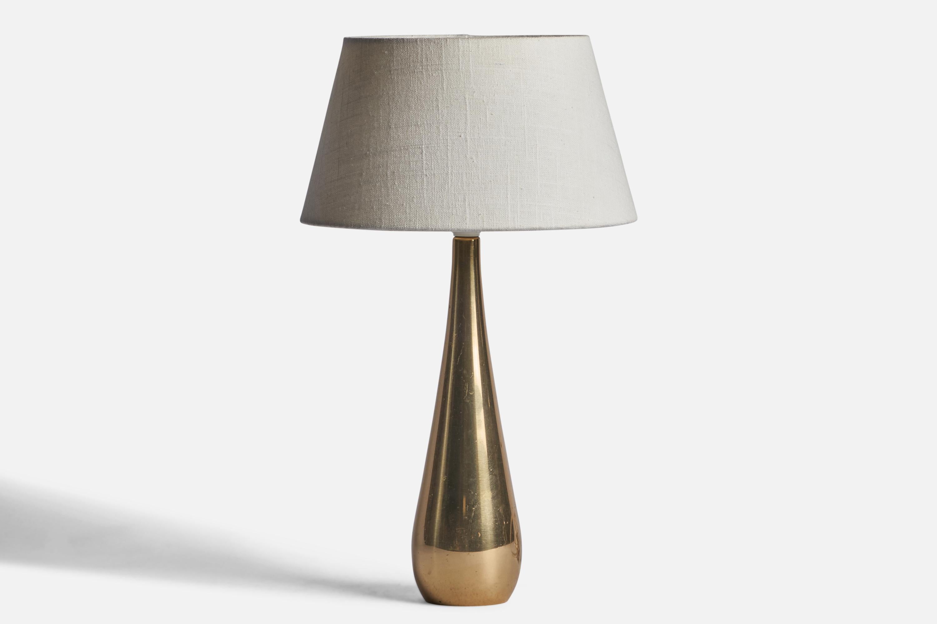 A brass table lamp designed by Mauri Almari and produced by Idman, Finland, 1950s.

Dimensions of Lamp (inches): 14.05” H x 3.3” Diameter
Dimensions of Shade (inches): 7” Top Diameter x 10” Bottom Diameter x 5.5” H 
Dimensions of Lamp with Shade
